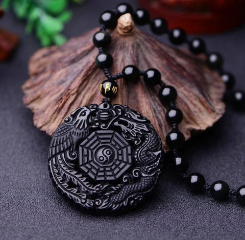 Amuleto Fénix y Dragón Obsidiana