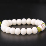 Pulsera de Loto Blanco con semillas de Bodhi blancas naturales